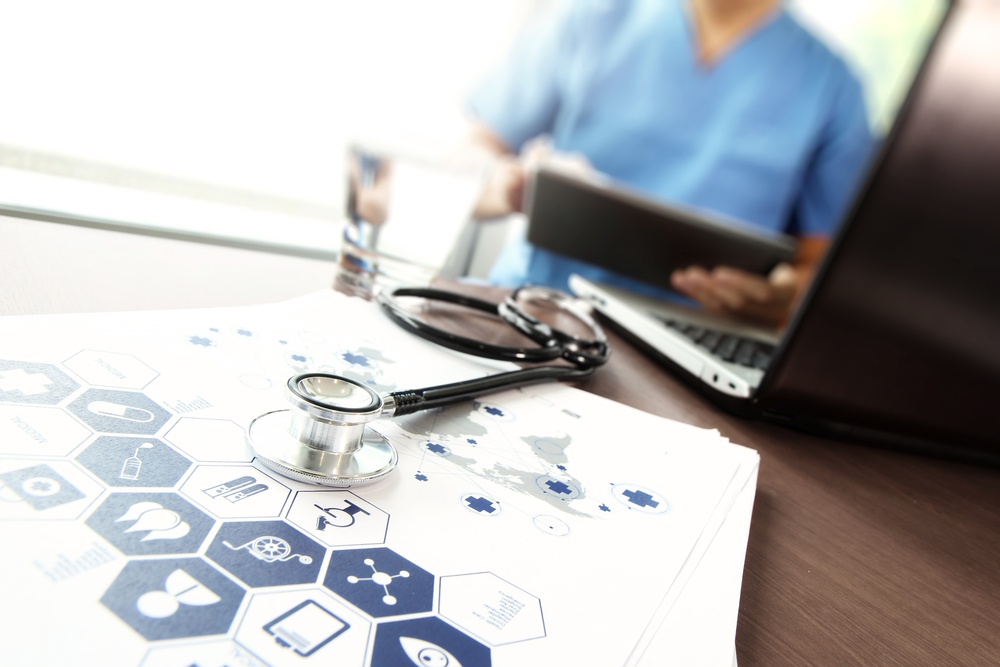 Doctor working with  laptop computer in medical workspace office and medical network media diagram as concept.jpeg