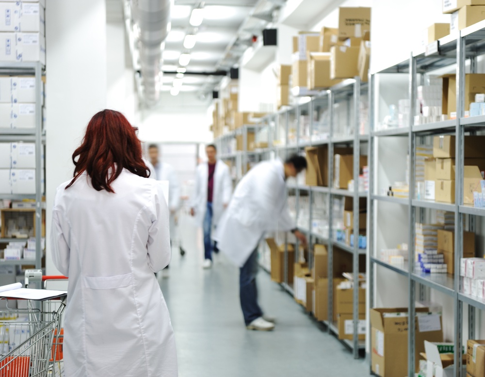 Workers at workplace, drug storage.jpeg
